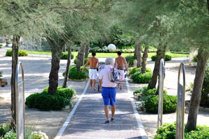 A walkway to the beach near the Piazzale Fellini