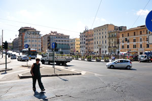 The five-way intersection connects the large roads of Via Labicana and Via dei Fori Imperiali