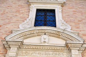 The entrance to the church building on Via Donato Bramante, 34