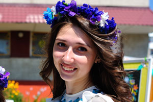 Two stunning Belarusian girls are in blue flower head wreaths