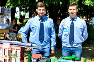Handsome boys from Belarusian Railways present the miniature of Railway station of the future