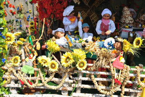 An outdoor decoration with flowers and toys