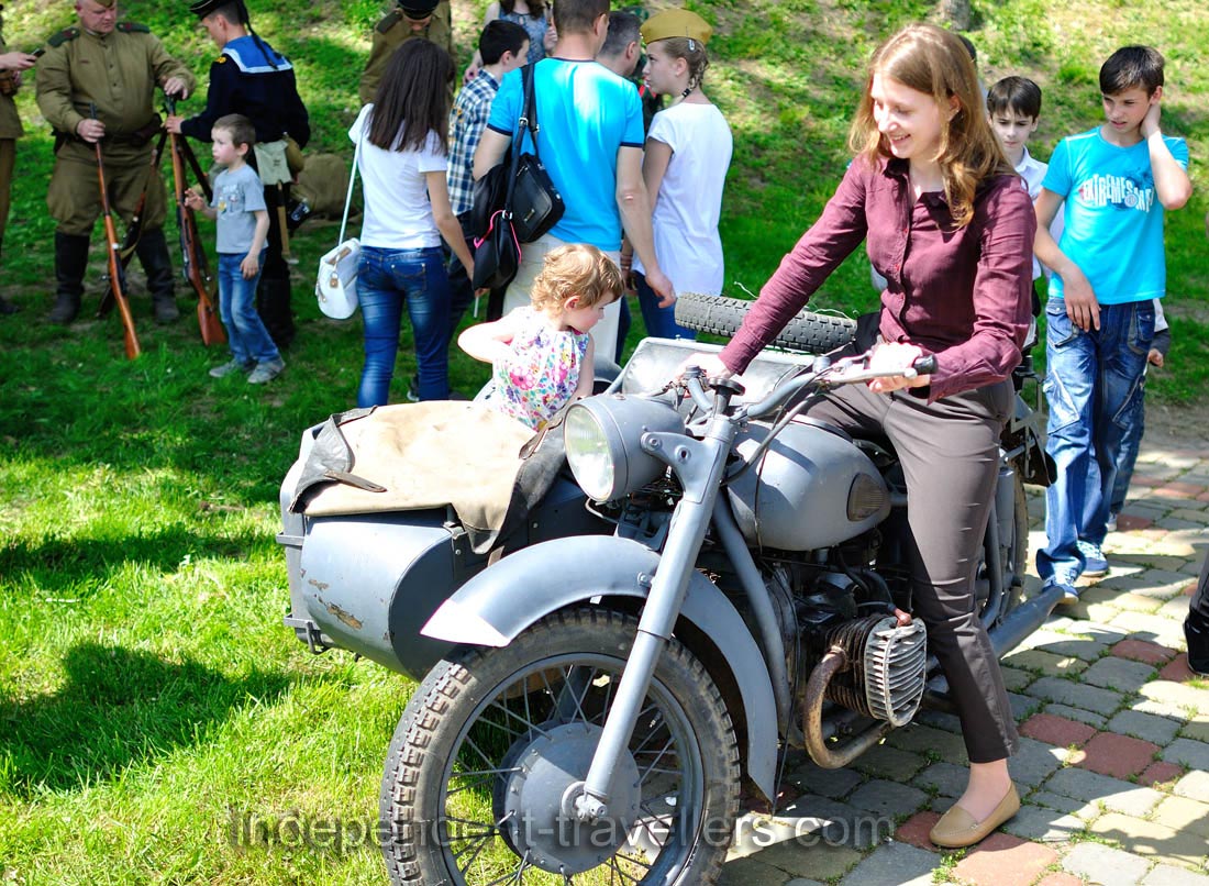 A girl is on the german motorcycle