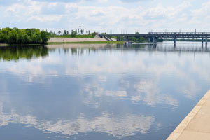 An automobile bridge spans over the river of Sozh