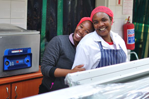Two funny female vendors are in Choppies Supermarket