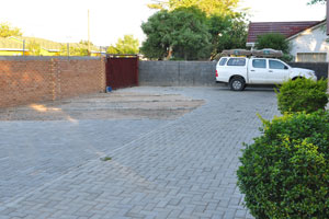 The parking lot of the Dacy Guest House