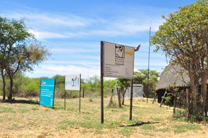 An information board lists the services and contacts of the animal sanctuary