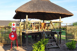 A gazebo is in Makumutu Lodge & Campsite