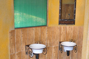 Wash basins are in the public toilet of Makumutu Lodge & Campsite