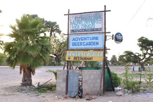 Advertisement boards “Adventure Beer Garden” and “General Dealer restaurant” are in Letlhakane