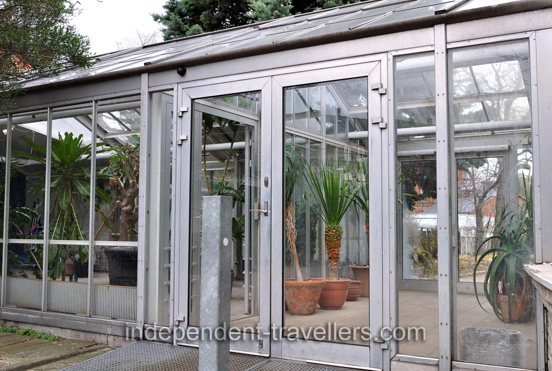 This glasshouse is constructed right before the entrance to the Palm House
