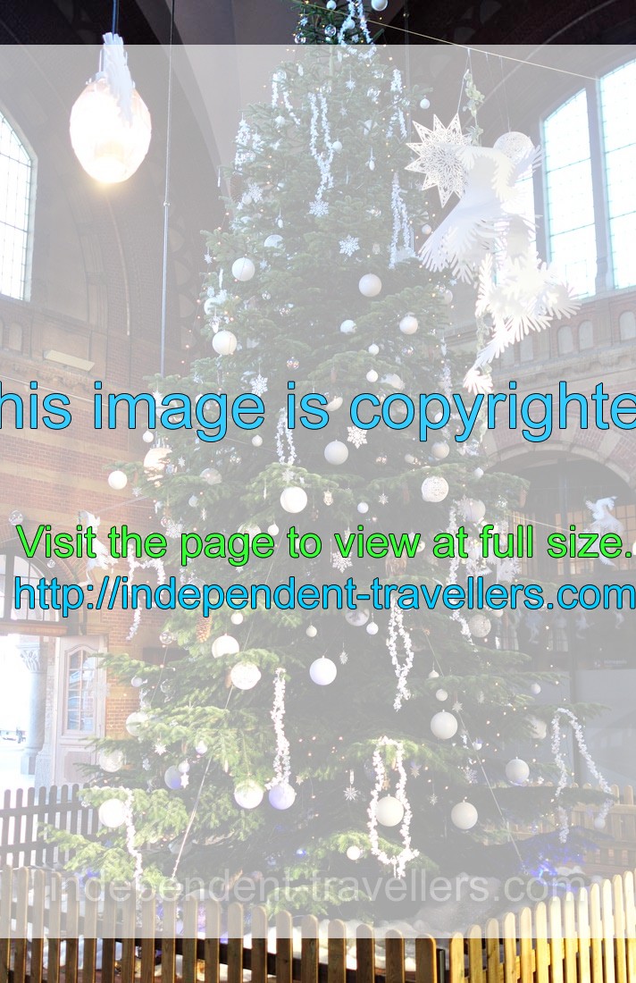 A Christmas tree decorates Copenhagen Central Station during Christmas time