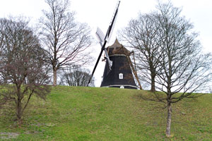 The windmill dominates the moat