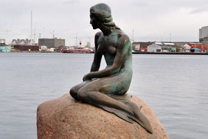 The Little Mermaid “Den lille Havfrue” is a bronze statue by Edvard Eriksen, depicting a mermaid