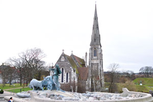 The Gefion Fountain is on the background of St. Alban's Church