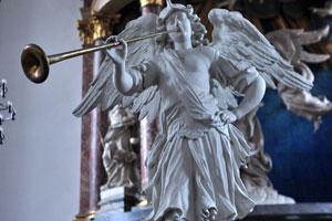 The Church of Our Saviour: a statue of an angel blowing a trumpet is situated in front of the altarpiece created by Nicodemus Tessin