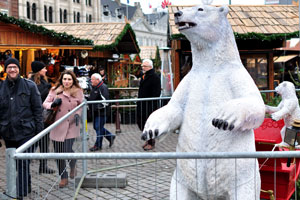 A white bear is at the Christmas market on Kongens Nytorv square