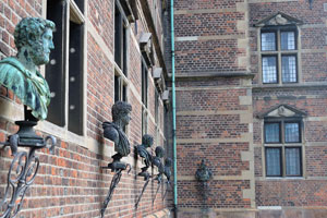 The busts are mounted on the wall of Rosenborg Castle
