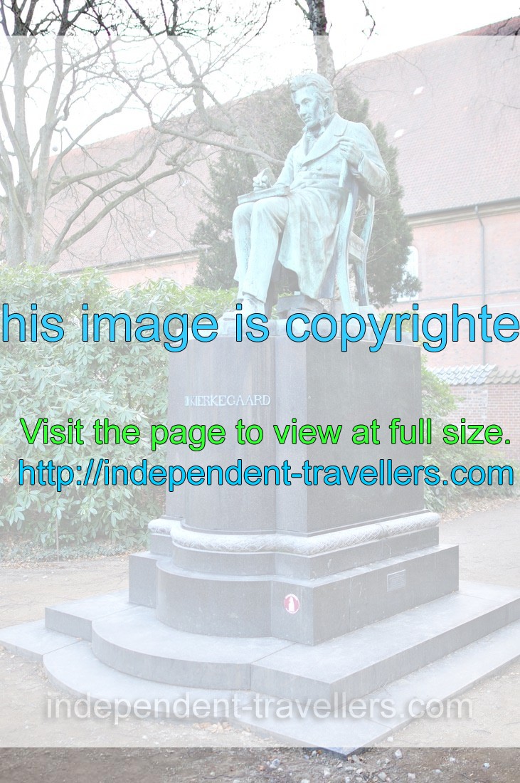 Statue of Søren Kierkegaard is located in the Royal Library garden
