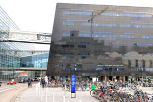 The huge bicycle parking is beside the Royal Library