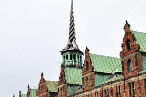 Børsen is most noted for its distinctive spire, shaped as the tails of four dragons twined together, reaching a height of 56 metres