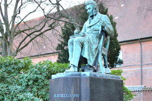 Statue of Søren Kierkegaard is located in the Royal Library garden