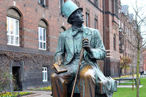 The statue of H.C. Andersen is located beside the City Town Hall