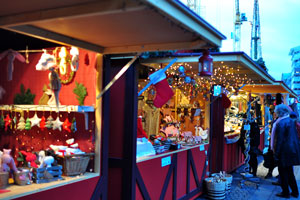 The Christmas market stalls at Højbro Plads square are decorated with romantic LED lights