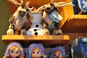 Snowman Olaf and reindeer Sven are for sale in Disney toy store