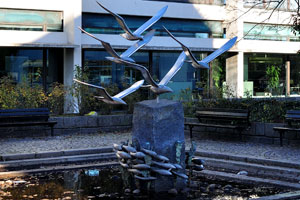 The Gulls and Fish statue is installed on Slotsgade street beside the Nordea bank