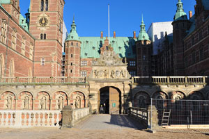 The symmetry of the Frederiksborg Castle main structure is broken by the large bell tower on the Chapel Wing
