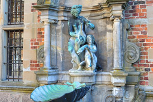 This bronze statue located in Frederiksborg Castle can function as a fountain