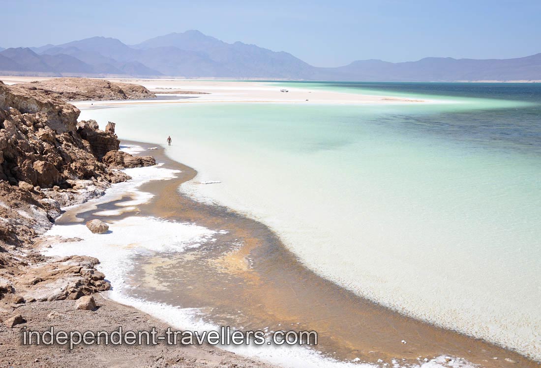 Lake Assal is a vast area of white and emerald surfaces