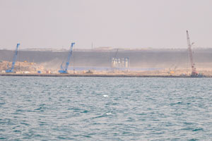 View from the ship on the construction work near the sea port