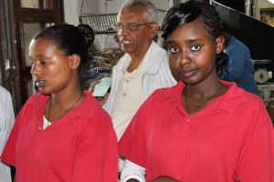 Young Ethiopian women in the shop at the cash register