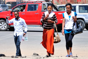 People at the intersection between Africa Avenue and Jomo Kenyatta Street