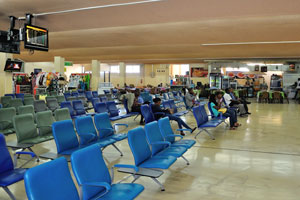 Some people wait their flights in the hall for domestic departures in Bole International Airport (ADD)