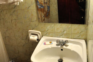 The washbasin in the bathroom of the room No. 202 in the Yilma hotel