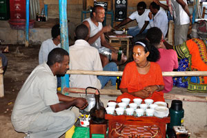 Coffee vendor in the cafe of the Afrera town