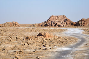 Road is laid between the salt natural formations in the Danakil desert