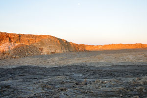 One may notice the camp in the distance placed on the edge of crater