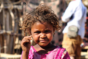 Cute little Afar girl with a funny hairstyle