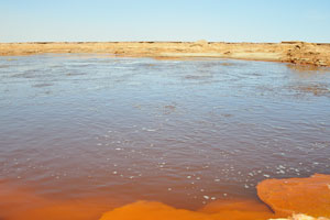 This little lake called by the Italian geologists “Yellow lake” because of the supersaturated red waters