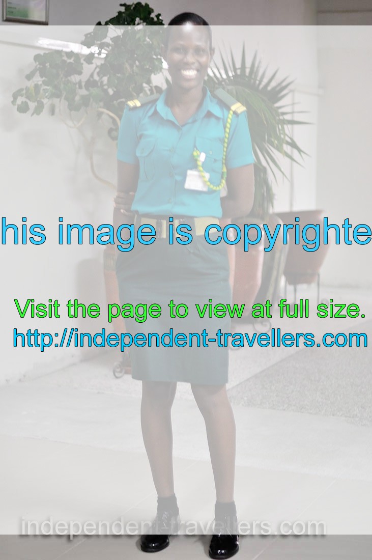 This charming girl with a smile serves as a guard in Kotoka International Airport