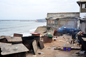 This kitchen at the open air is located on the shore of the Gulf of Guinea
