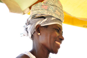 A Ghanaian female vendor is in a good mood