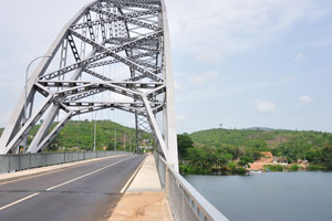The Adomi bridge spans the Volta river that drains into the Gulf of Guinea