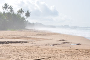 Axim Beach is covered with mist in the morning