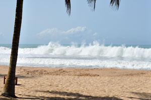 Wild ocean waves on the Axim Beach can be dangerous