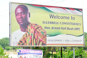 A billboard reads “Welcome to Ellembelle Constituency”